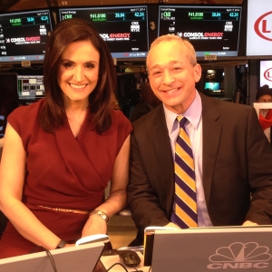 Client Larry Glazer with Michelle Caruso-Cabrera for CNBC's Closing Bell at the Stock Exchange in New York
